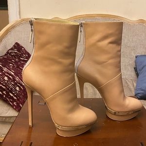 Brian Atwood cream colored boots